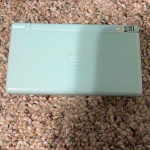Nintendo Ds with games and charger
